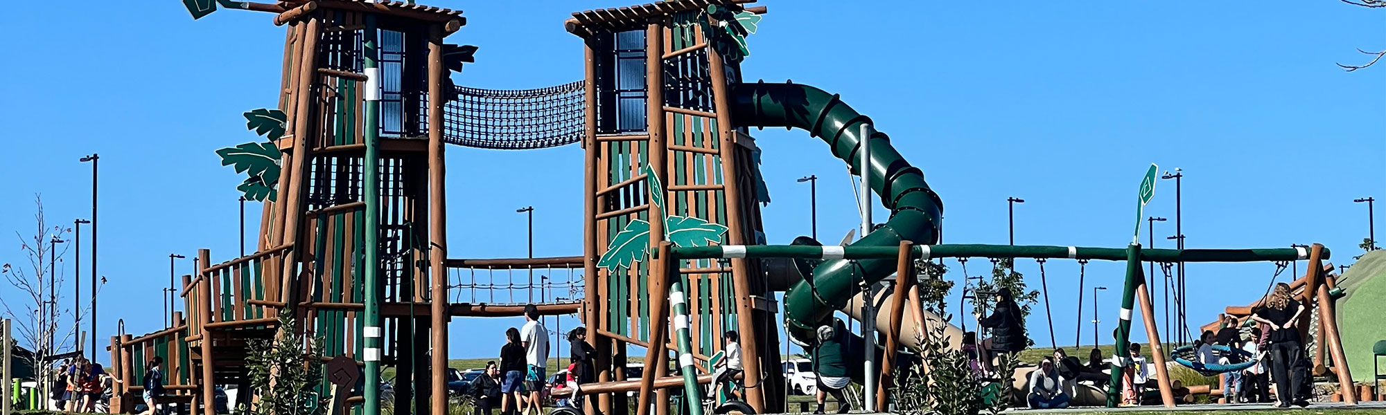 Children playing at the playground at Pohe Island