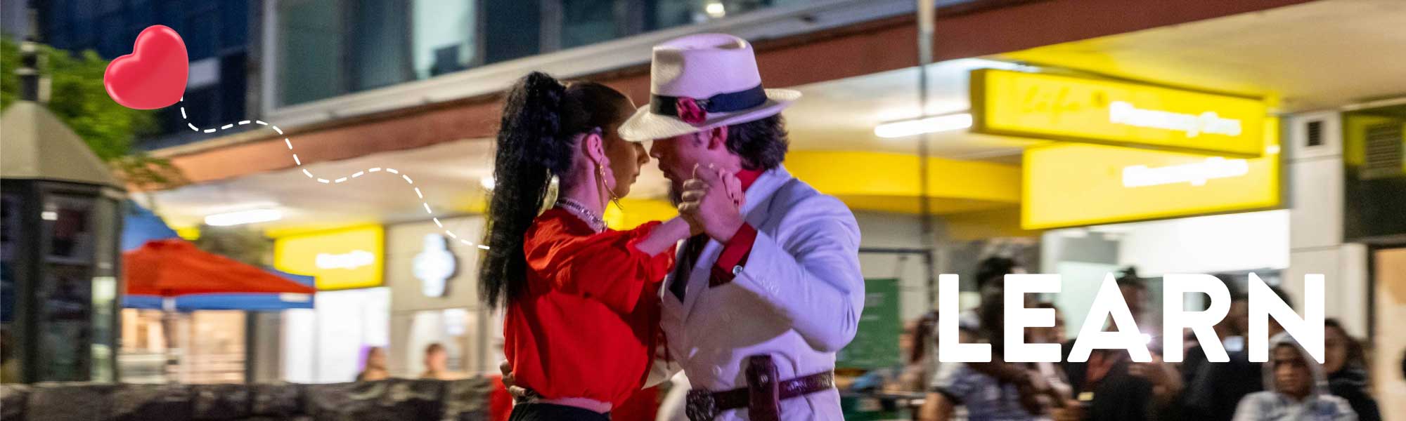 A couple do a Latin dance in Whangarei City Centre