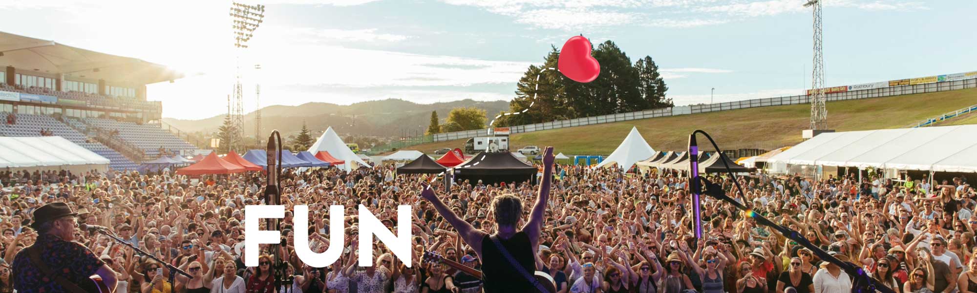 An image showing people enjoying a concert at Semenoff Stadium 