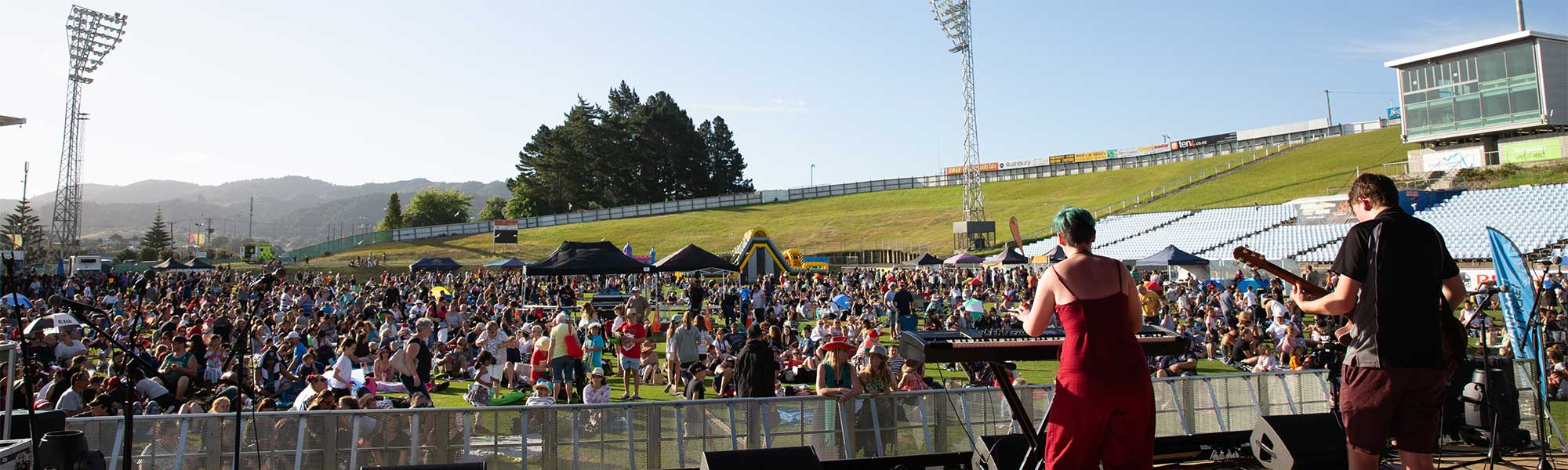 Crowd enjoying a singer at the Christmas Festival